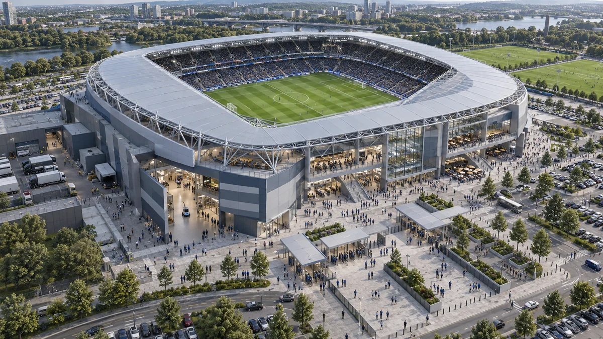 Large football stadium with seating bowl, concourses, entrance plazas and service areas.